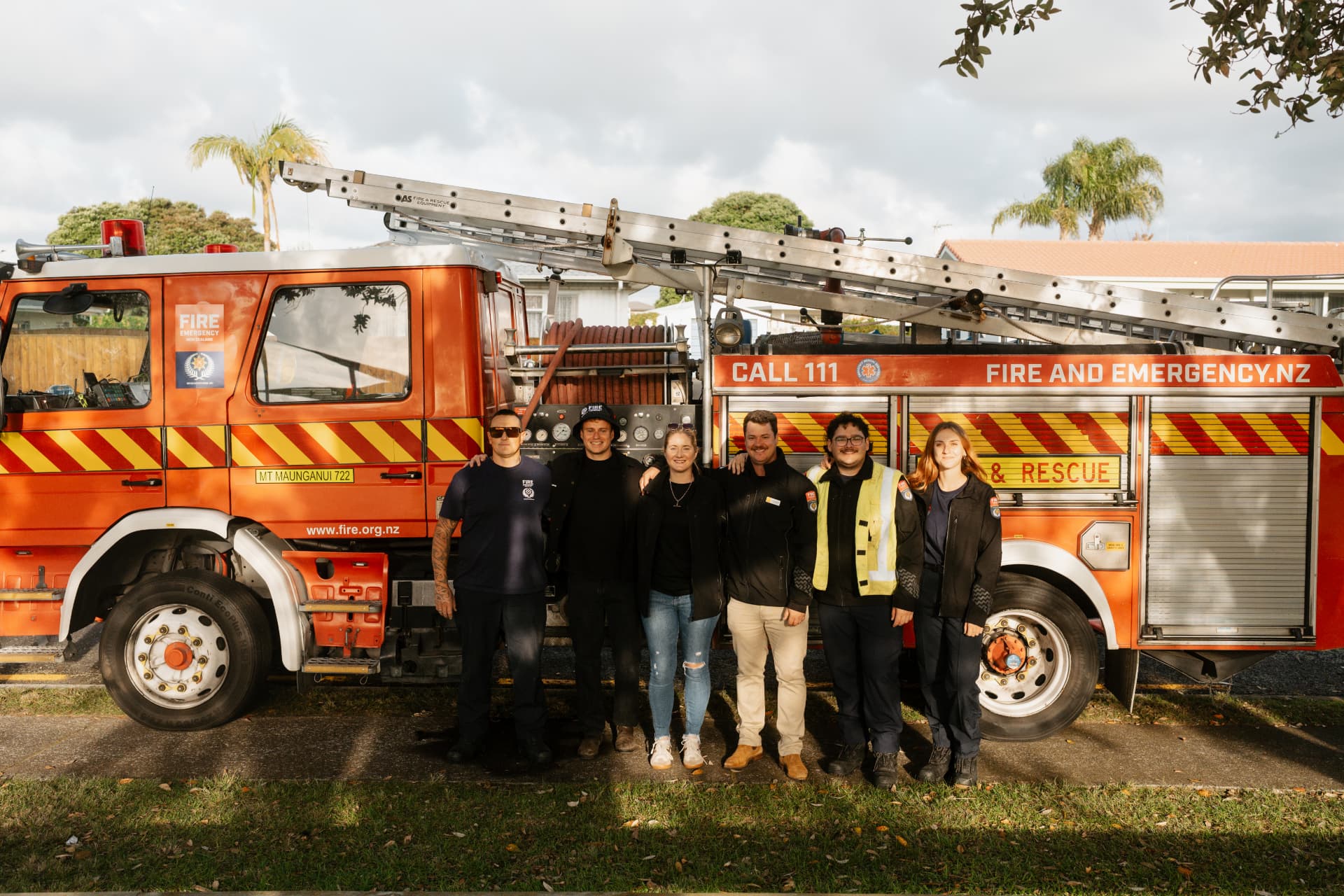 The McKenzie & Co team with the Mount Maunganui Fire and Emergency crew